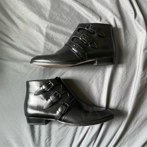 Michael by Michael Kors black leather flat bootie with buckles, size 7 M